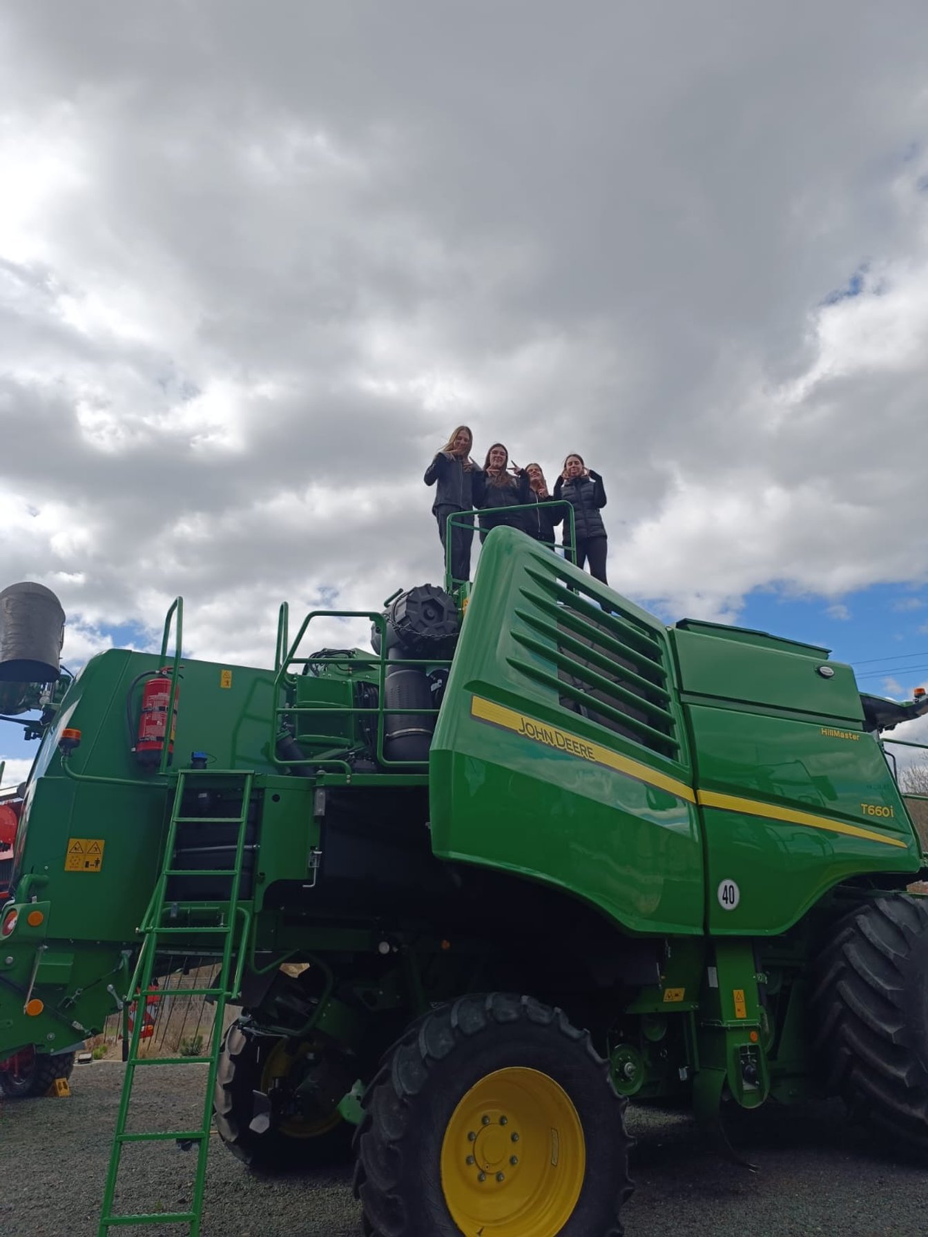 Osmáci ve firmě John Deere