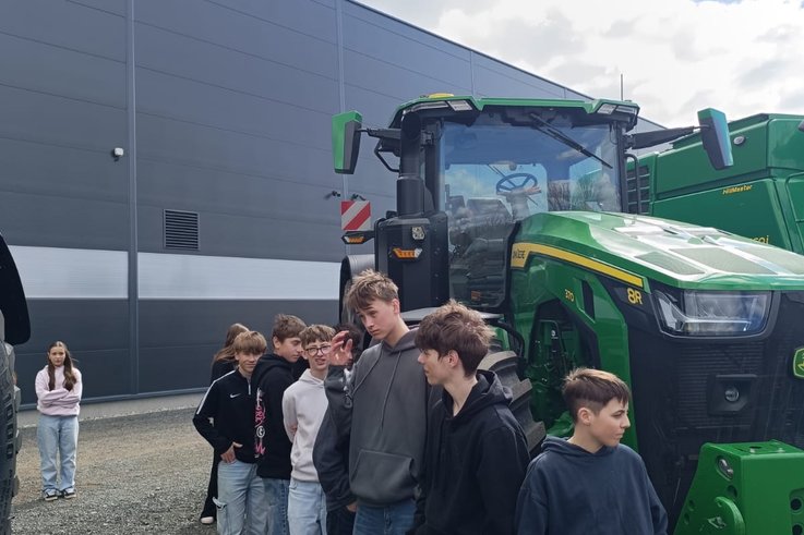 Osmáci ve firmě John Deere